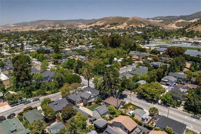 1263 Pismo St, San Luis Obispo, CA 93401 - aerial view of property and surrounding area with a mountain backdrop and nearby suburban area
