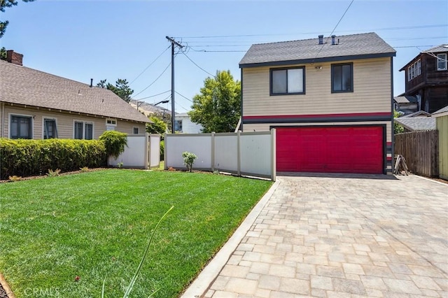 1263 Pismo St, San Luis Obispo, CA 93401 - view of yard featuring a garage and decorative driveway