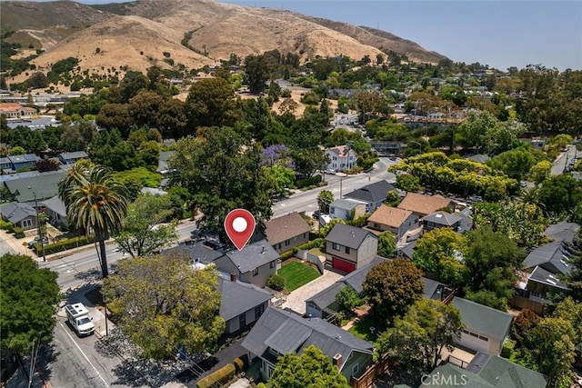 1263 Pismo St, San Luis Obispo, CA 93401 - aerial overview of property's location featuring nearby suburban area and a mountain backdrop