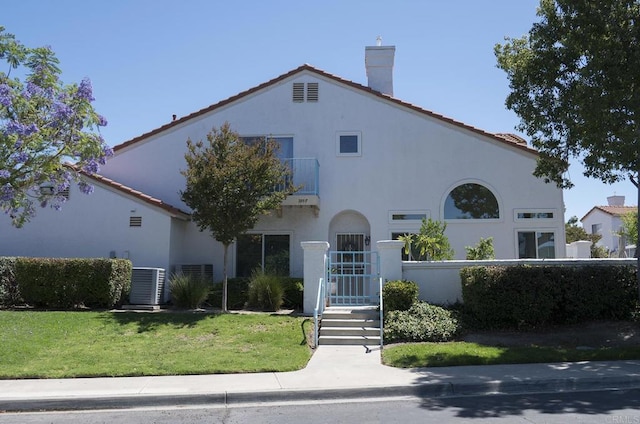 29517 Cara Way, Temecula, CA 92591 - mediterranean / spanish home with a balcony, stucco siding, a chimney, and a tiled roof