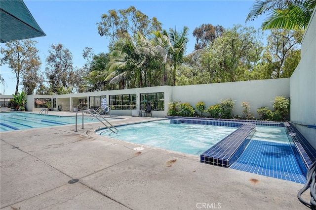 5490 Paseo Del Lago W Unit P, Laguna Woods, CA 92637 - community pool with a patio