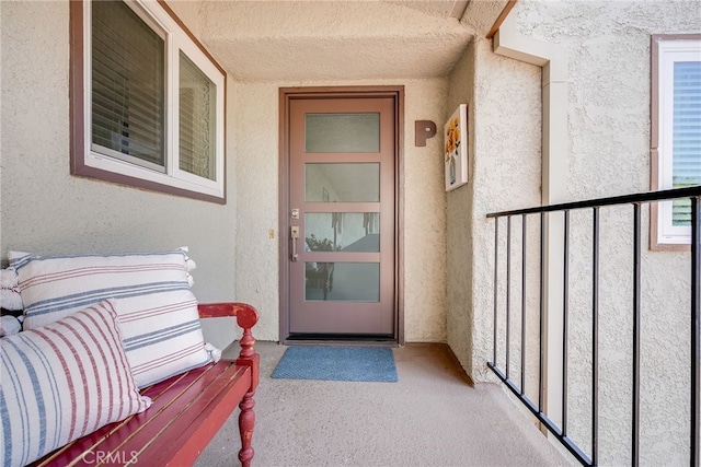 5490 Paseo Del Lago W Unit P, Laguna Woods, CA 92637 - entrance to property featuring stucco siding and a balcony