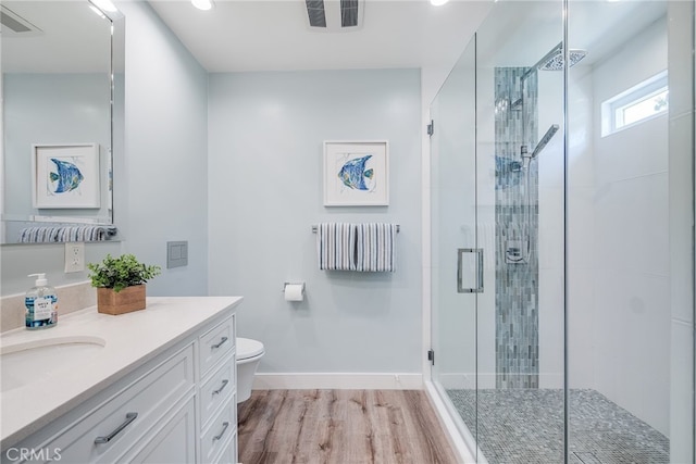 5490 Paseo Del Lago W Unit P, Laguna Woods, CA 92637 - bathroom featuring vanity, a shower stall, wood finished floors, and recessed lighting