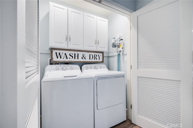 5490 Paseo Del Lago W Unit P, Laguna Woods, CA 92637 - laundry area with cabinet space, washing machine and clothes dryer, and wood finished floors