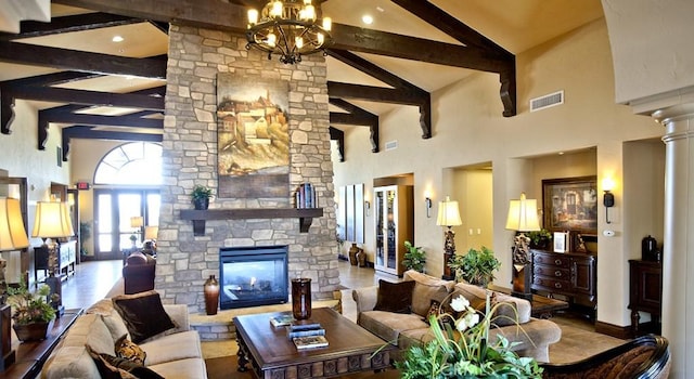 5490 Paseo Del Lago W Unit P, Laguna Woods, CA 92637 - living area featuring high vaulted ceiling, a fireplace, beamed ceiling, and ornate columns
