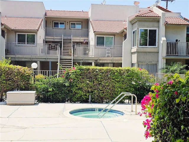 874 Cinnamon Ln Unit 62, Duarte, CA 91010 - view of pool featuring a community hot tub