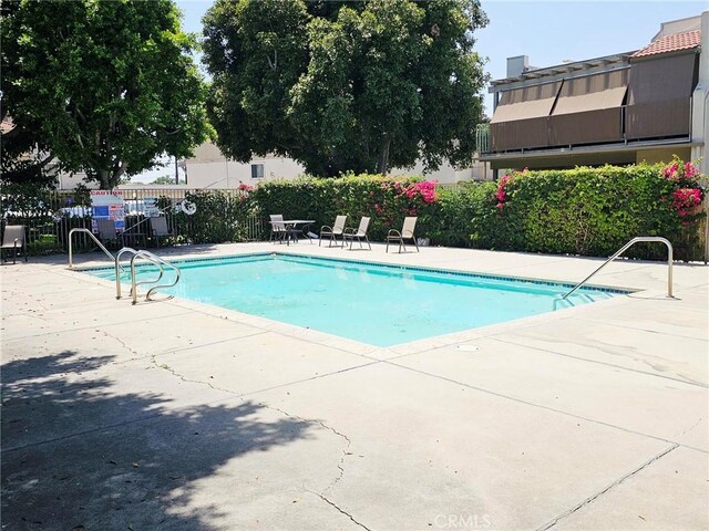 874 Cinnamon Ln Unit 62, Duarte, CA 91010 - community pool featuring a patio