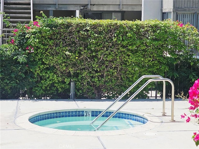 874 Cinnamon Ln Unit 62, Duarte, CA 91010 - view of swimming pool featuring a community hot tub