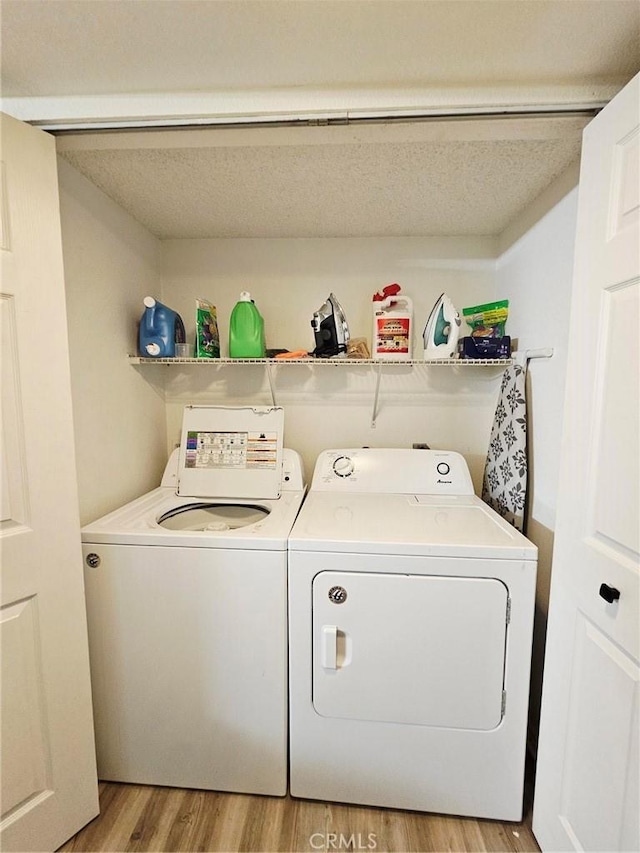 874 Cinnamon Ln Unit 62, Duarte, CA 91010 - laundry room with washing machine and dryer and light wood-style floors