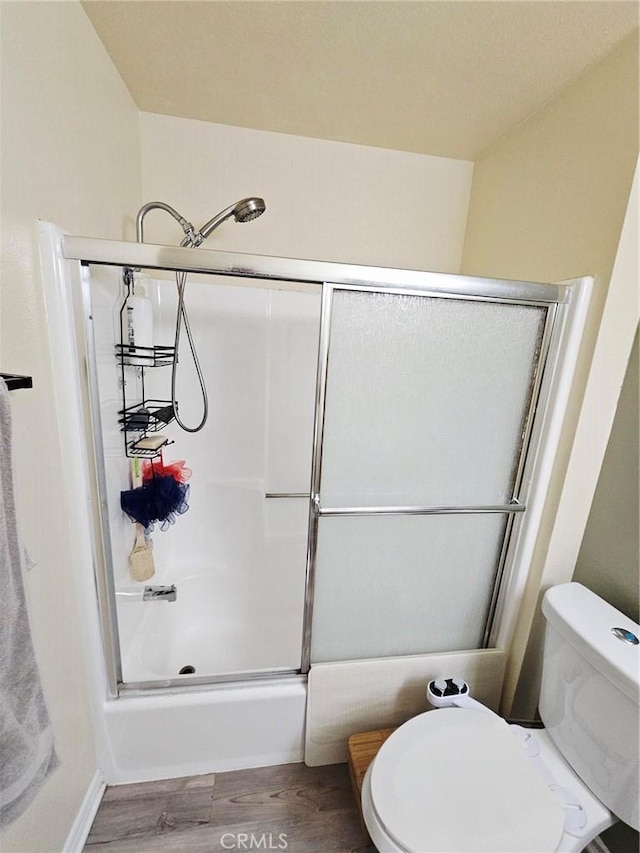 874 Cinnamon Ln Unit 62, Duarte, CA 91010 - bathroom featuring wood finished floors and a shower with door