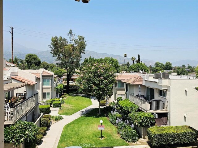 874 Cinnamon Ln Unit 62, Duarte, CA 91010 - surrounding community featuring a mountain view, a residential view, and a yard