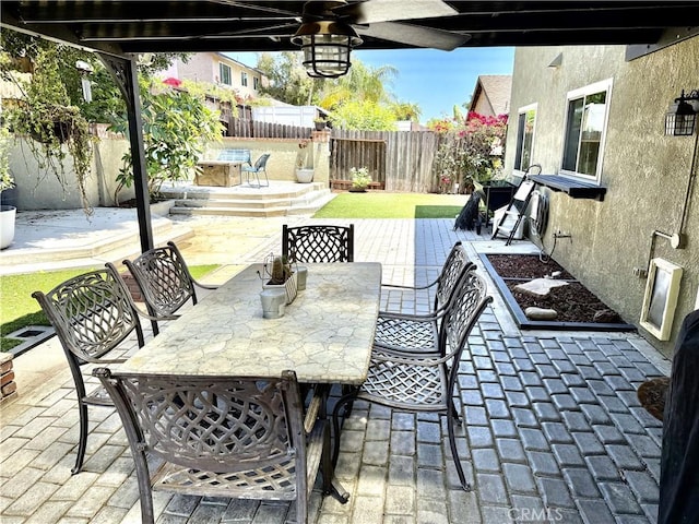 1171 Silverfern Ln, Corona, CA 92878 - fenced backyard with outdoor dining space, a patio area, and a wooden deck