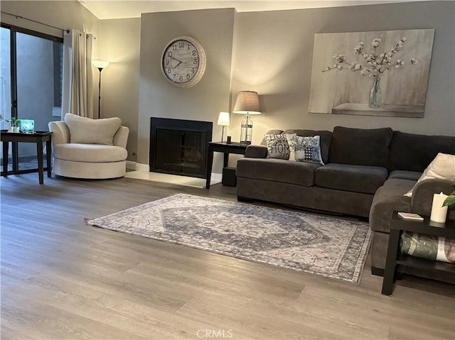1137 Mountain Gate Rd, Upland, CA 91786 - living area with wood finished floors and a fireplace