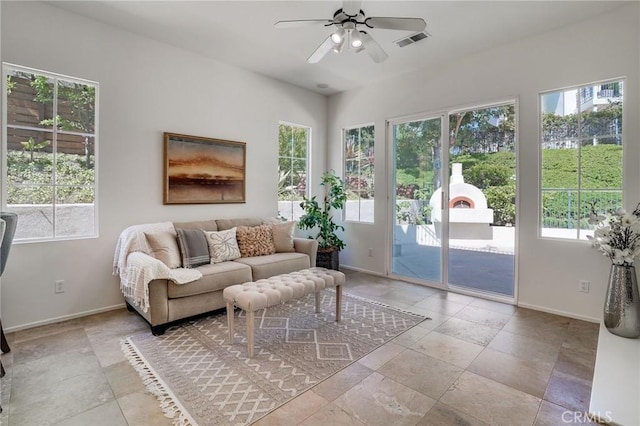 53 Via Palacio, San Clemente, CA 92673 - living room featuring a ceiling fan and light stone finish floors