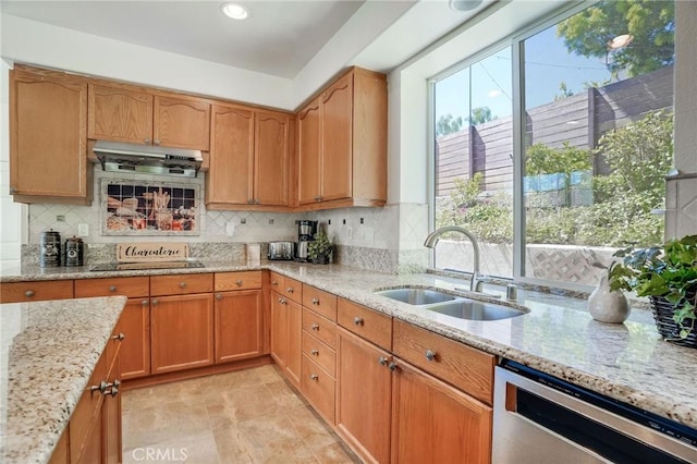 53 Via Palacio, San Clemente, CA 92673 - kitchen with stainless steel dishwasher, light stone countertops, backsplash, and recessed lighting