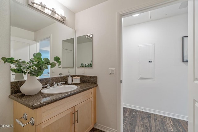 931 E Walnut St Unit 508, Pasadena, CA 91106 - bathroom featuring electric panel, wood finished floors, and vanity