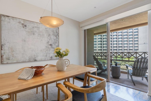 931 E Walnut St Unit 508, Pasadena, CA 91106 - dining space featuring wood finished floors and expansive windows