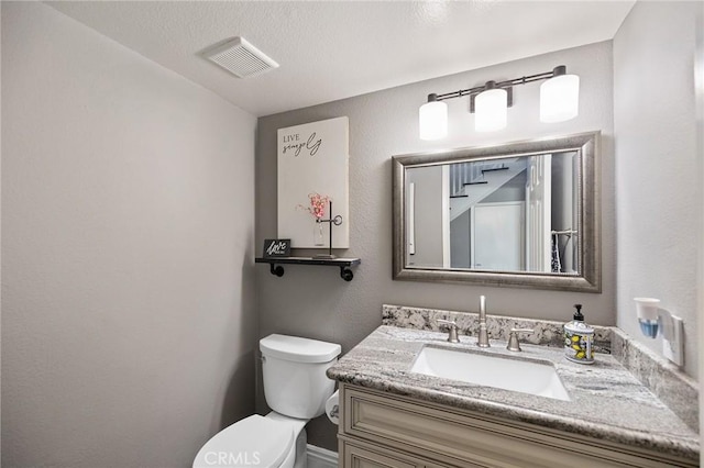 6095 Windemere Way, Riverside, CA 92506 - half bathroom featuring toilet and vanity