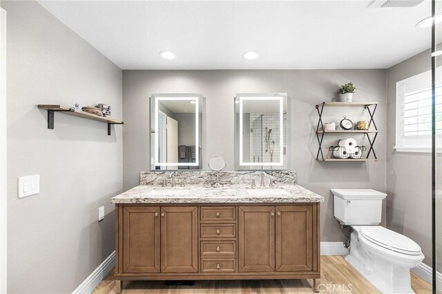 6095 Windemere Way, Riverside, CA 92506 - full bath featuring wood finished floors and double vanity