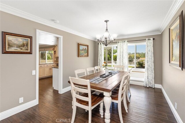 6095 Windemere Way, Riverside, CA 92506 - dining room featuring a chandelier, ornamental molding, and dark wood-style floors