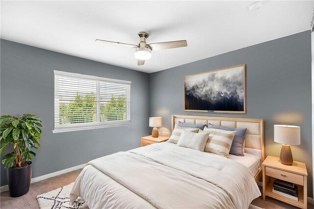 6095 Windemere Way, Riverside, CA 92506 - carpeted bedroom featuring baseboards and a ceiling fan
