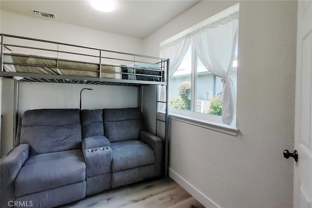 1034 Occidental Cir, Redlands, CA 92374 - bedroom featuring baseboards and light wood finished floors