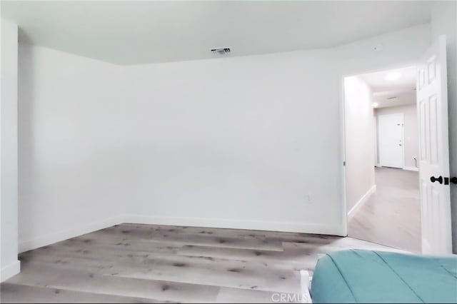 1034 Occidental Cir, Redlands, CA 92374 - unfurnished room with baseboards and wood finished floors