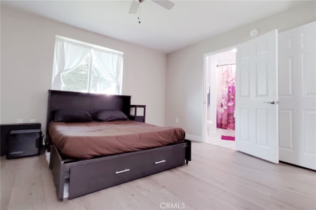 1034 Occidental Cir, Redlands, CA 92374 - bedroom with wood finished floors, ensuite bath, and ceiling fan