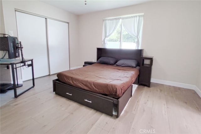 1034 Occidental Cir, Redlands, CA 92374 - bedroom with a closet and light wood-style flooring