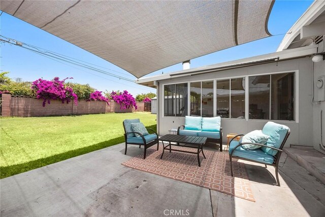 18101 Kirk Ave, Tustin, CA 92780 - fenced backyard featuring a sunroom, a patio area, and an outdoor hangout area