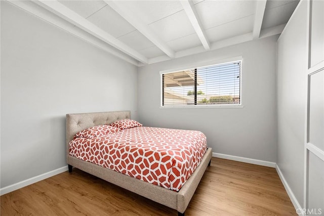 18101 Kirk Ave, Tustin, CA 92780 - bedroom featuring beamed ceiling and wood finished floors