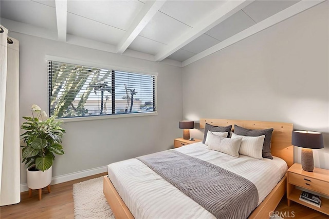 18101 Kirk Ave, Tustin, CA 92780 - bedroom with wood finished floors and beamed ceiling