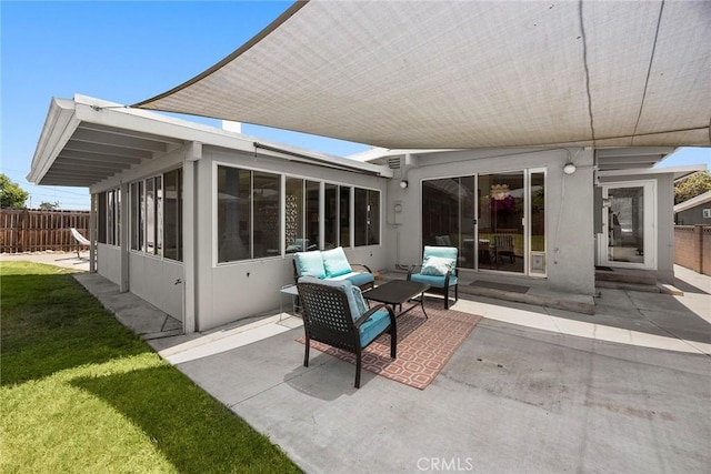 18101 Kirk Ave, Tustin, CA 92780 - back of house with a patio area, a sunroom, and outdoor lounge area