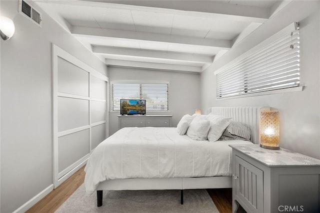 18101 Kirk Ave, Tustin, CA 92780 - bedroom featuring beamed ceiling and wood finished floors