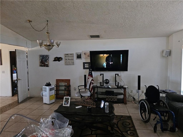 16709 Deodar St, Hesperia, CA 92345 - living room featuring tile patterned floors, a chandelier, and a textured ceiling