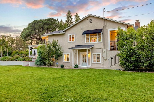 3326 Los Olivos Ln, Glendale, CA 91214 - view of front of house featuring a lawn and stucco siding