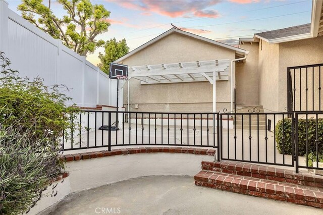 3326 Los Olivos Ln, Glendale, CA 91214 - patio terrace at dusk with a pergola