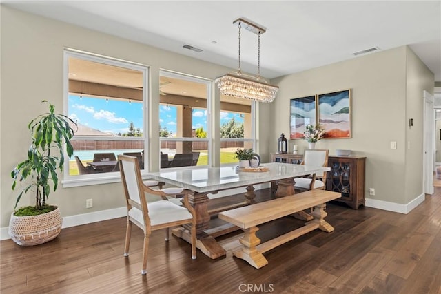 5031 San Juanico Dr, Chico, CA 95973 - dining room with wood finished floors and a chandelier