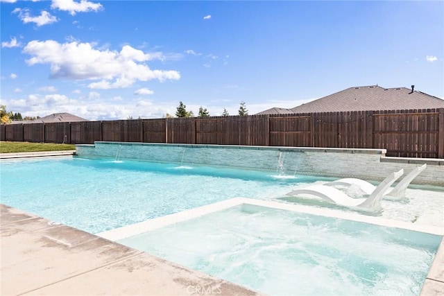 5031 San Juanico Dr, Chico, CA 95973 - view of pool with a fenced backyard and a pool with connected hot tub