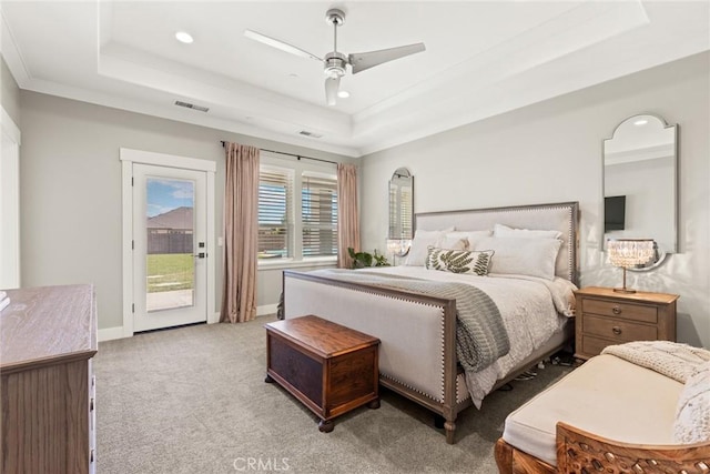 5031 San Juanico Dr, Chico, CA 95973 - carpeted bedroom featuring a tray ceiling, access to exterior, recessed lighting, and a ceiling fan