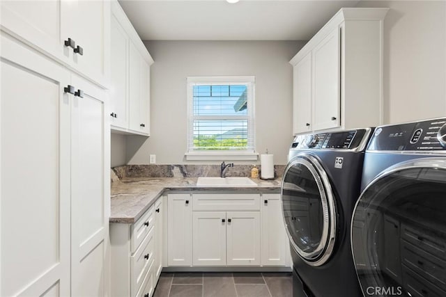 5031 San Juanico Dr, Chico, CA 95973 - washroom with separate washer and dryer, cabinet space, and tile patterned floors