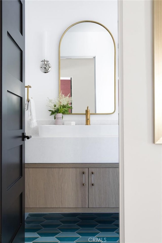 19476 Woodlands Dr, Huntington Beach, CA 92648 - bathroom featuring vanity and tile patterned floors