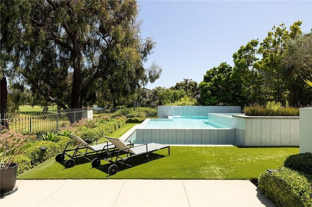 19476 Woodlands Dr, Huntington Beach, CA 92648 - view of swimming pool with view of wooded area