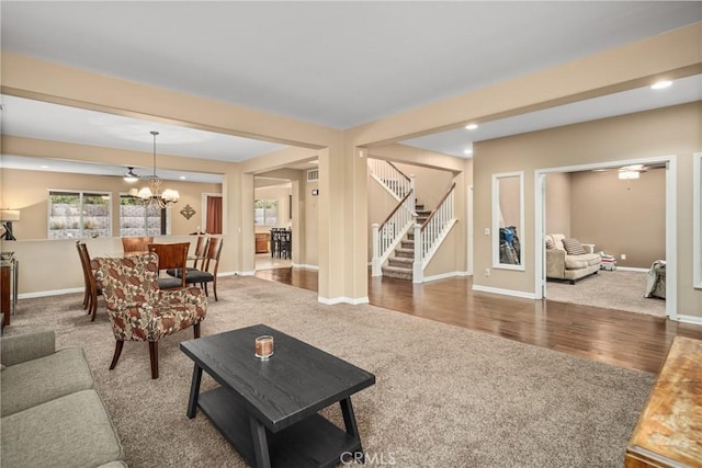 7116 W W Ave L4, Lancaster, CA 93536 - living room featuring carpet flooring, stairs, a chandelier, and recessed lighting