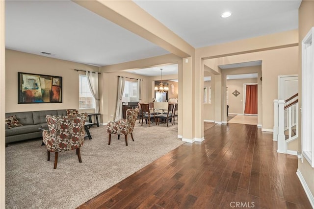 7116 W W Ave L4, Lancaster, CA 93536 - living area with wood finished floors, a chandelier, stairs, and recessed lighting