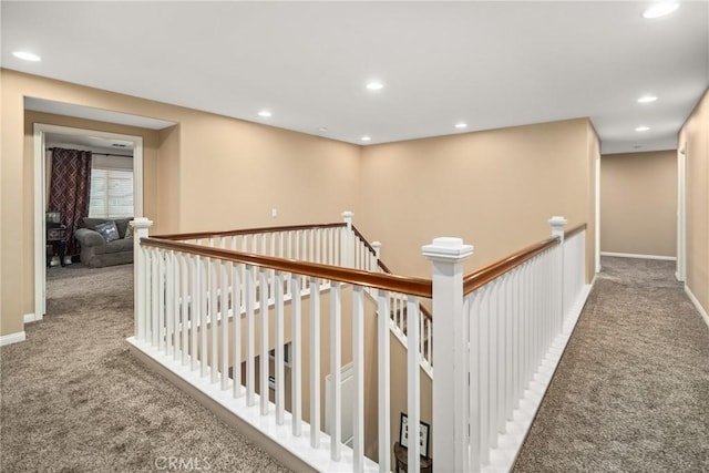 7116 W W Ave L4, Lancaster, CA 93536 - hall with an upstairs landing, carpet, and recessed lighting