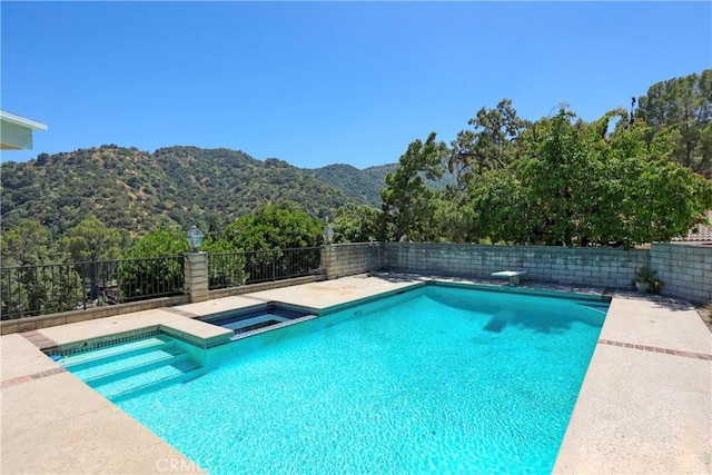 3260 Beaudry, Glendale, CA 91208 - view of pool featuring a mountain view, a fenced backyard, and a pool with connected hot tub