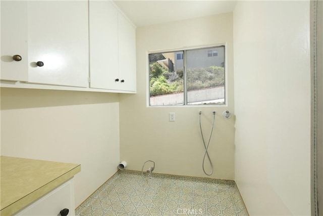 3260 Beaudry, Glendale, CA 91208 - laundry room featuring cabinet space and light flooring