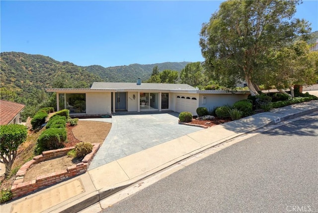3260 Beaudry, Glendale, CA 91208 - single story home with a mountain view, driveway, an attached garage, and stucco siding