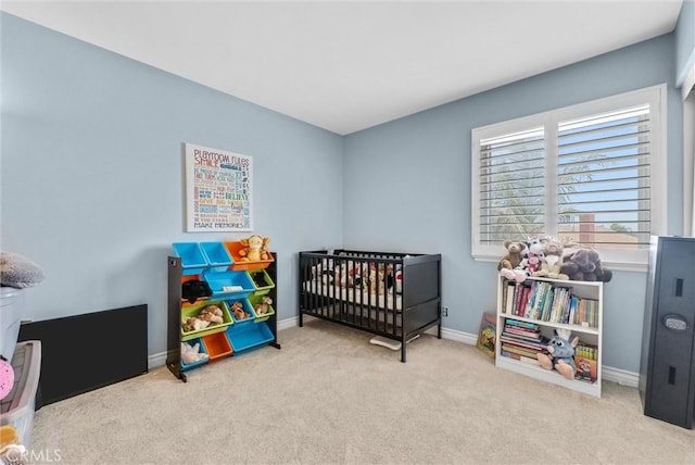 1160 Baseline Rd, La Verne, CA 91750 - carpeted bedroom featuring a crib and baseboards